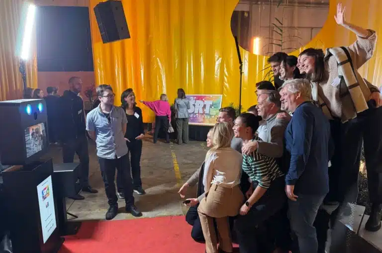 Group making XL mosaic-wall with host